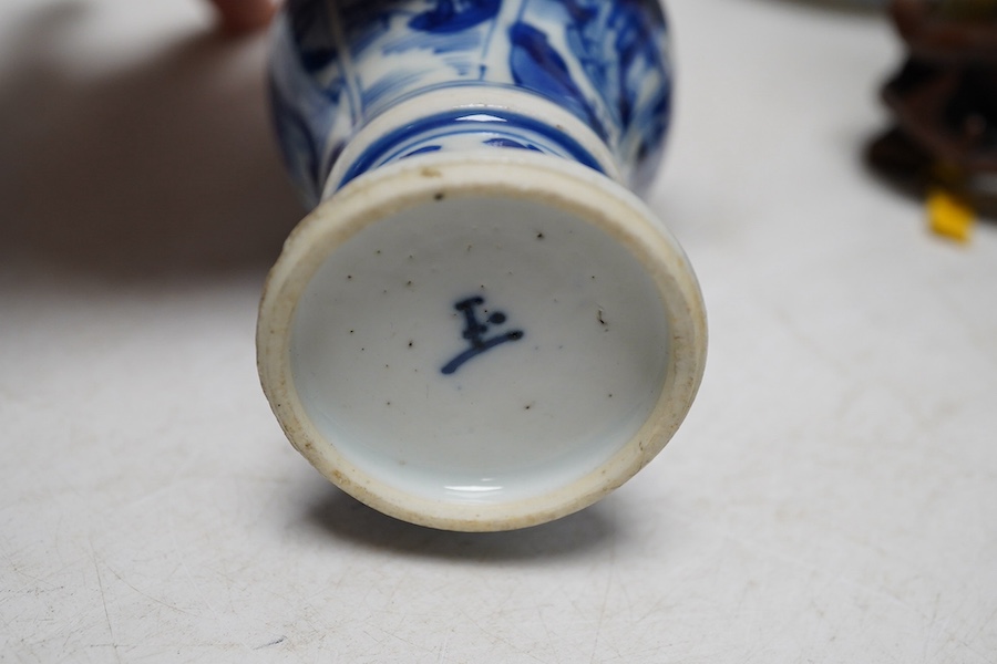 A group of Chinese and Japanese items to include a Kangxi miniature blue and white vase and matched cover, a blue and white cup and a cloisonné jar and cover, tallest 16cm. Condition - varies